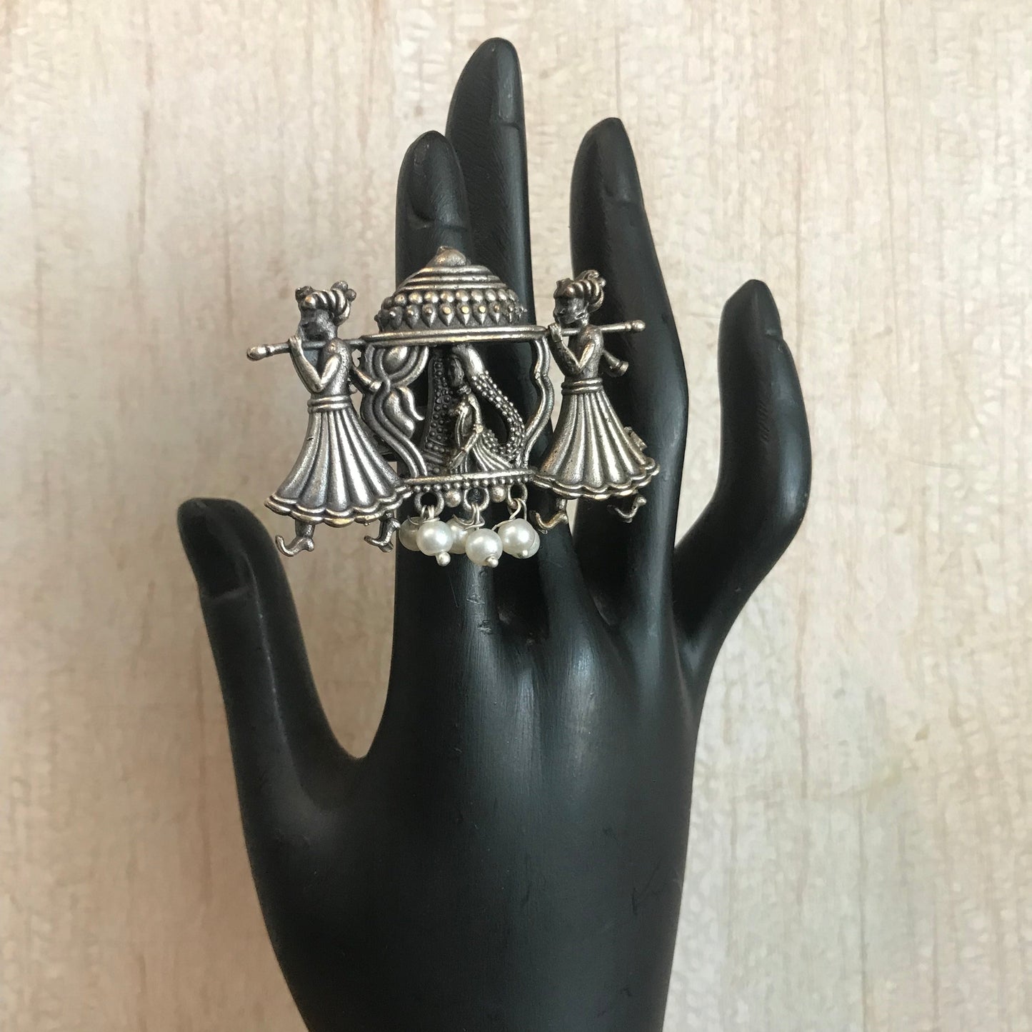 Oxidized Silver Ring Featuring Traditional Palanquin Scene with Dancing Figures and Hanging Pearls