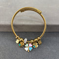 Gold-toned cable wire bangle bracelet.