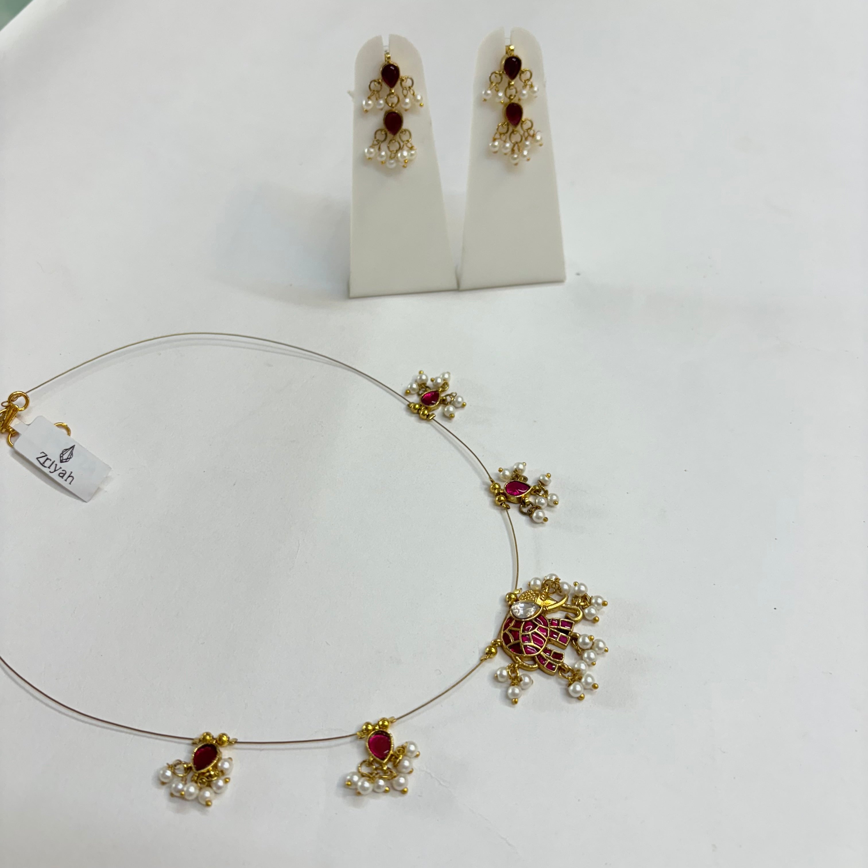 Invisible Pink Kundan Elephant Pendant Necklace Set