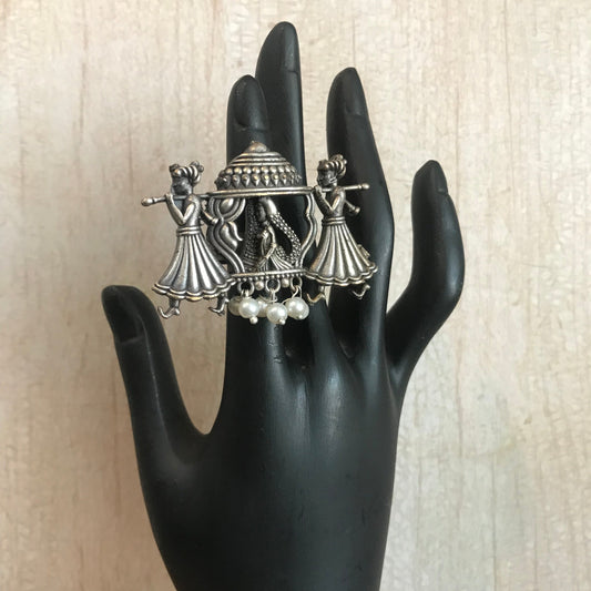 Oxidized Silver Ring Featuring Traditional Palanquin Scene with Dancing Figures and Hanging Pearls