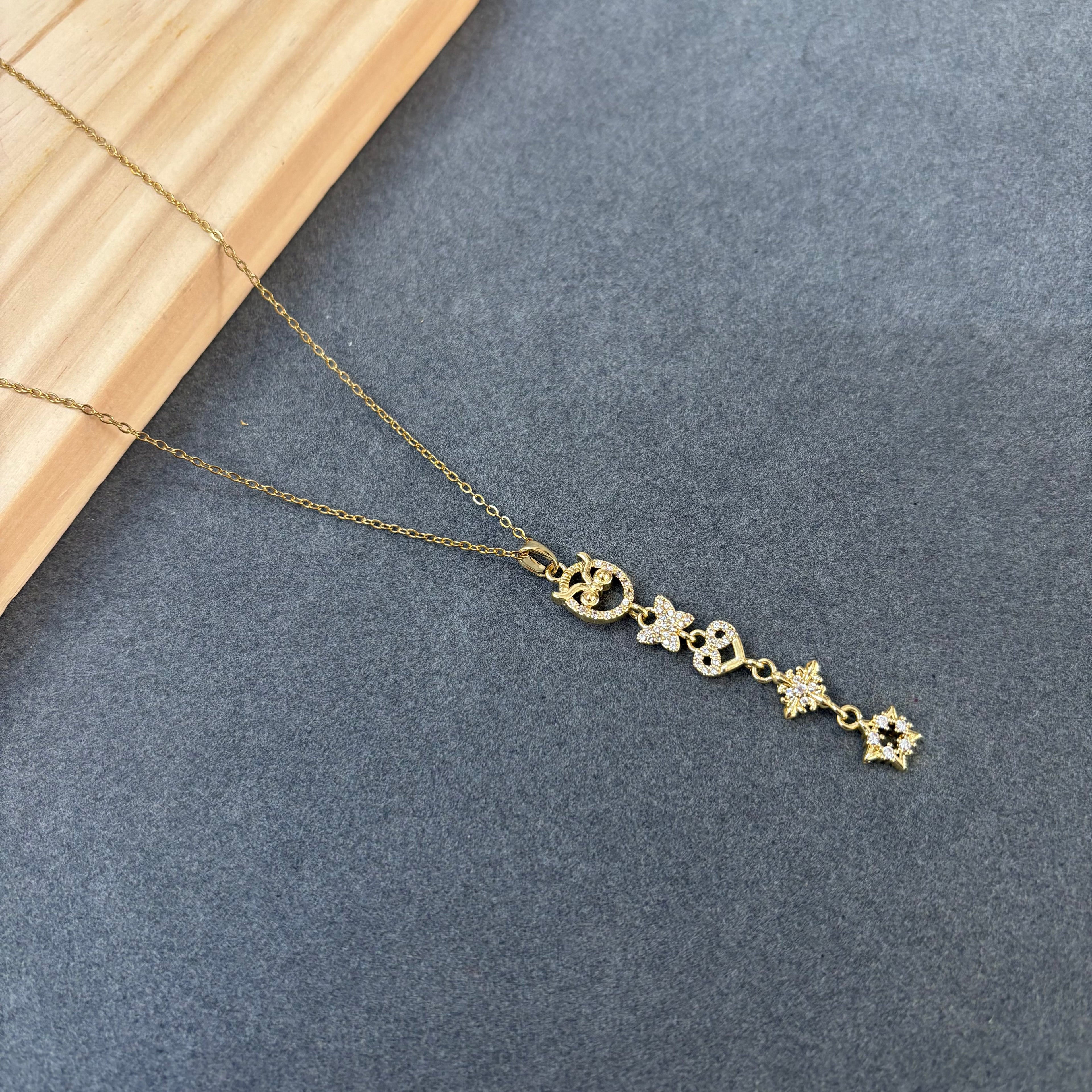 Long charm pendent necklace