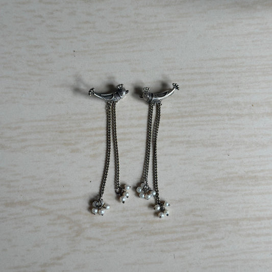Oxidised silver earrings with fish design studs, dual chain drops, and tiny pearl hangings.