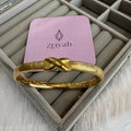 Elegant textured band with a central infinity symbol design kada bracelet