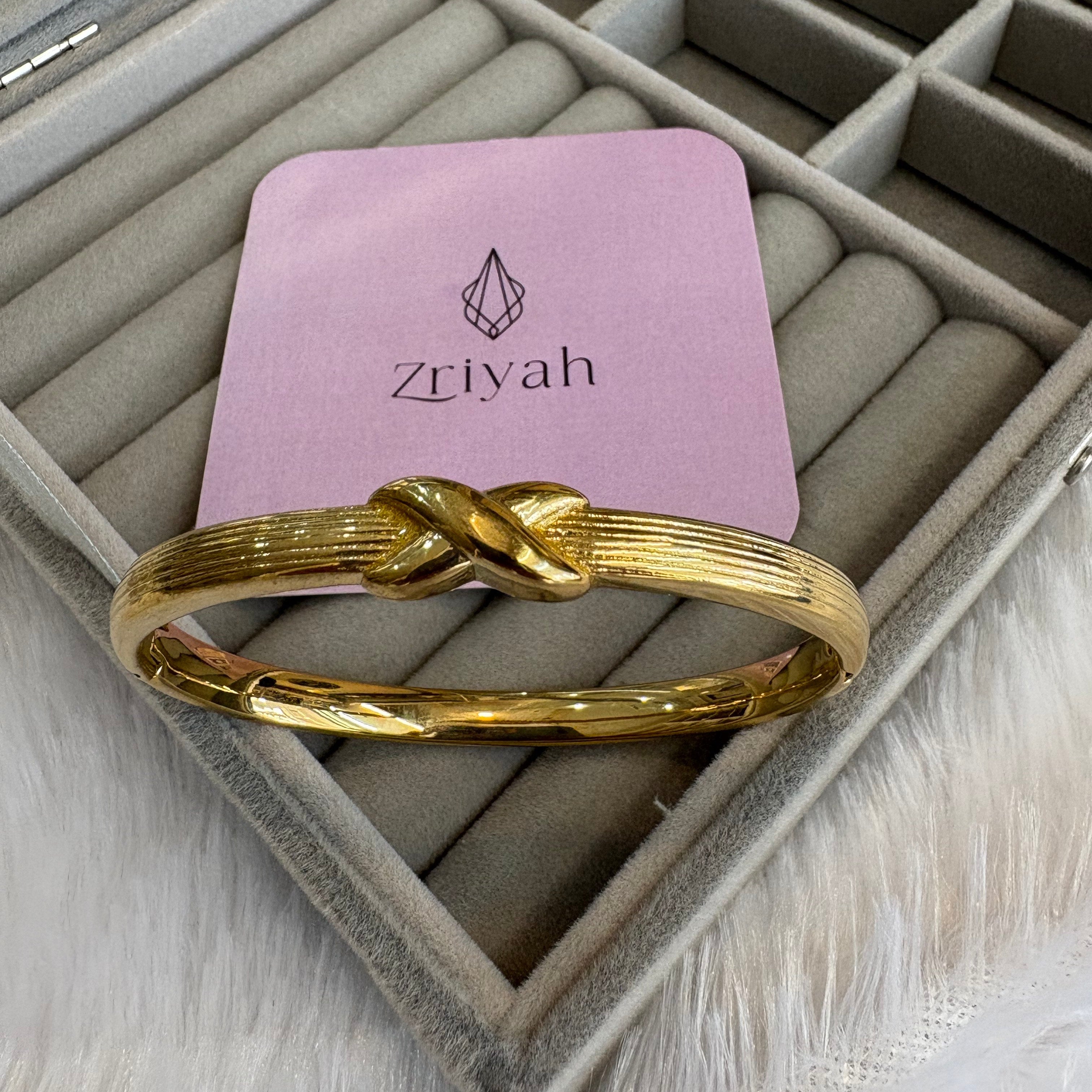 Elegant textured band with a central infinity symbol design kada bracelet